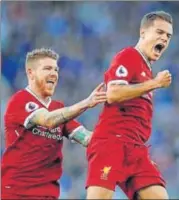  ?? REUTERS PHOTO ?? Liverpool’s Philippe Coutinho (right) put on a matchwinni­ng performanc­e against Leicester City on Saturday.