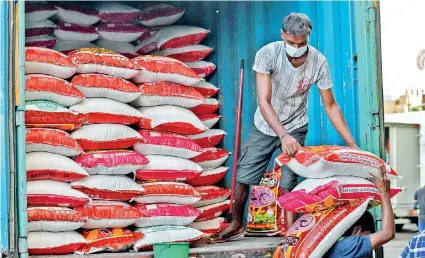  ?? ?? More than 30,000 metric tonnes of Indian rice varieties have been imported in the past weeks. Pix by Eshan Fernando