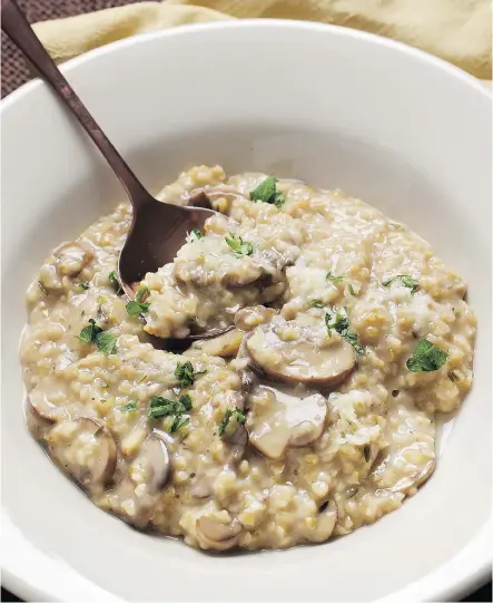  ?? DEB LINDSEY/FOR THE WASHINGTON POST ?? Mushroom Oat Risotto can be served as a starter or side dish with roasted poultry or meat, or it can be served with a salad in a larger portion as a vegetarian main course.