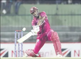  ??  ?? Man-of-the-Match and Series, Andre Russell blasted a cameo, unbeaten 40 to see the West Indies overhaul Sri Lanka’s 1556.