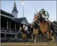  ?? DARRON CUMMINGS/AP ?? Joel Rosario rides Accelerate to victory in the Breeders’ Cup Classic horse race at Churchill Downs, Saturday, Nov. 3, 2018, in Louisville, Ky.