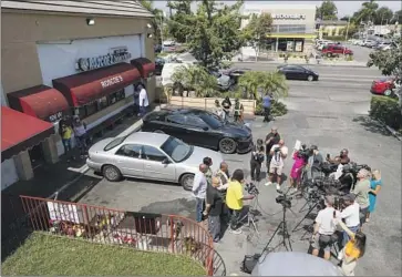  ?? Robert Gauthier ?? A NEWS CONFERENCE is held Tuesday following the fatal shooting of rapper PnB Rock at a Roscoe’s House of Chicken & Waffles. “The violence has to stop, because you can’t even go out to eat,” a customer said.