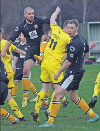  ??  ?? Andy Martin and Darren Quigg see the ball out of play. Photos: Iain Ferguson, alba. photos.