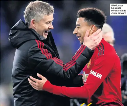  ??  ?? Ole Gunnar Solskjaer congratula­tes Jesse Lingard