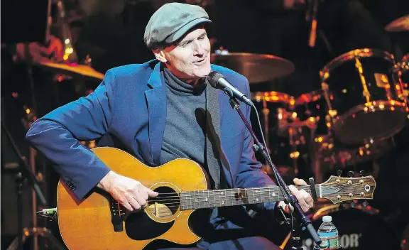  ?? SCOTT ROTH/THE ASSOCIATED PRESS ?? Unlike some of his musical contempora­ries, 70-year-old singer-songwriter James Taylor has no plans to stop touring.