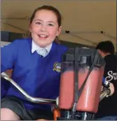  ??  ?? Ciara Plunkett trying out the smoothie bike.