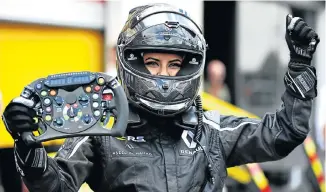  ?? Picture: MARK THOMPSON/ GETTY IMAGES ?? BREAKING BARRIERS: Aseel AlHamad, of Saudi Arabia, after driving the Renault F1 car at the race in France yesterday