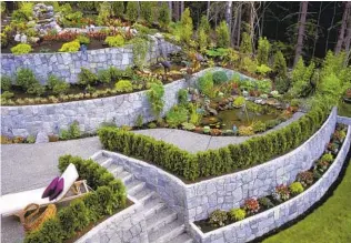  ?? GETTY IMAGES ?? Garden walls, which are usually 1 to 2 feet high, can be built as a DIY project, although they do require some heavy lifting.