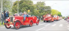  ??  ?? AN Austin Seven fire engine in the parade.