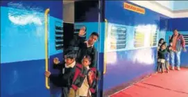  ?? HT PHOTO ?? Students of Government Primary School that runs in a train-like structure in Dholpur district.