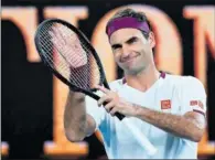  ?? ?? Roger Federer aplaude al público durante un torneo.