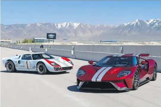  ?? PHOTOS: FORD ?? The focus of the 2017 Ford GT, shown to the right of the original GT40, is on aerodynami­c design, not cramming horsepower and torque under the hood.