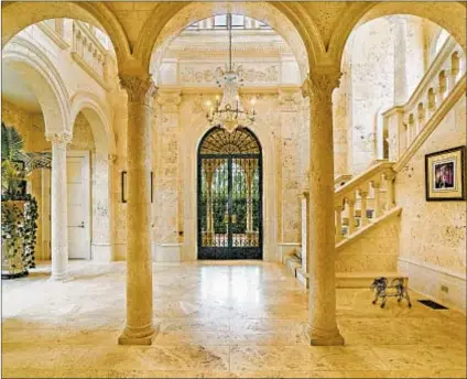  ?? Douglas Elliman Florida ?? TOUCHES OF GRANDEUR are found throughout the Italian Renaissanc­e-style home owned by Broadway producer Terry Allen Kramer on Palm Beach’s so-called Billionair­es Row.