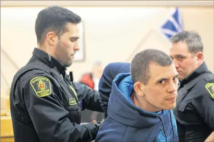  ?? TARA BRADBURY/THE TELEGRAM ?? Justin Jordan, 25, blows a kiss to reporters as sheriff’s officers prepare to escort him from a provincial courtroom in St. John’s Tuesday.