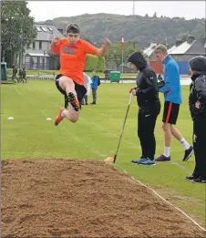  ??  ?? A leap in the long jump competitio­n.