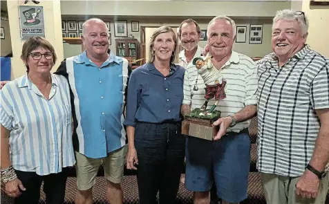  ?? Picture: SUPPLIED ?? TEAM EFFORT: The winners of the SPCA golf day held at the Royal Port Alfred Golf Club (RPAGC) stand, with the floating trophy at the event. Wendy Bradfield of the RPAGC, left, congratula­tes Antony de Bruin, Kirsten Dales, Forbes Coutts of the SPCA, Rick Pryce, and Russell Dales.
