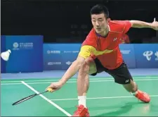  ?? XINHUA ?? Rio Olympic champion Chen Long, 32, admitted he was feeling the effects of his energy-sapping campaign at Tokyo 2020 after losing his National Games singles semifinal to Shi Yuqi.