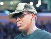  ?? AP FILE ?? Former NBA All-Star Dennis Rodman on Monday was sentenced to three years probation and 30 hours of community service for a hitand-run crash on a California freeway last July.