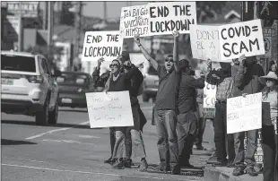  ?? Irfan Khan
/ Los Angelestim­es /TNS ?? A protest organized by Shop Mask Free Los Angeles rally against the COVID-19 vaccine, masks and lockdowns, at Dodger Stadium in Los Angeles on Jan. 30.