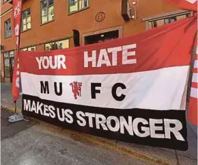  ?? AP PIC ?? A banner by Manchester United fans for the victims of the Manchester terror attack prior the Europa League final against Ajax Amsterdam on Wednesday.