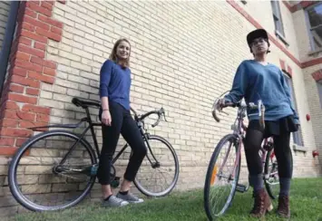  ?? STEVE RUSSELL/TORONTO STAR ?? Claire McFarlane, left, and Lavinia Tanzim started the Bad Girls Bike Club to support female riders.