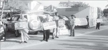  ??  ?? The handful of protestors outside the AFC headquarte­rs yesterday