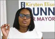  ?? HYOSUB SHIN / HYOSUB.SHIN@AJC.COM ?? Kirsten Elise Dunn announces her candidacy Wednesday in downtown Atlanta. The mother of four aims to connect with residents who are apathetic about voting because they feel left out at City Hall.