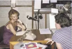  ??  ?? Left, Capital Radio staff at an event in the 1980s. Above, Scottish singer Lulu is interviewe­d in the studio