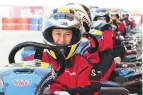  ??  ?? Above: Young drivers at the Dwight School Festival of Speed held at Dubai Autodrome on December 8. Left: Grade 9 pupils Chiara Pistilli, Sofia Langthjem, Amber-Rose McCauley and Romy Wegmann.