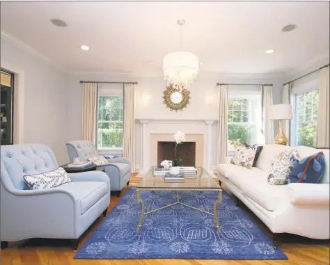  ?? Coldwell Banker ?? The formal living room at 4 Timber Lane in Westport features a fireplace. The stately colonial is set on 1.2 acres.