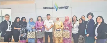  ??  ?? Sharbini (sixth left) with Dayang Morliah (seventh left) and other Sabati members and SEB management personnel during the courtesy visit.