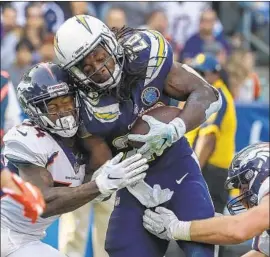  ?? Robert Gauthier Los Angeles Times ?? MELVIN GORDON is in the final year of the deal he signed with the Chargers in 2015. In 2018, he scored 14 touchdowns despite missing four games.