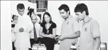  ??  ?? Minister Patali Champika Ranawaka and U.S Ambassador.Michele J.Sison viewing the product demo “Automated Guided Wheelchair” from University of Colombo School of Computing