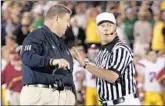  ?? Photograph­s by Alex Gallardo Los Angeles Times ?? IRISH COACH Charlie Weis can’t convince referee Jack Wood that the clock has run out.