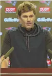  ?? STAFF PHOTO BY JOHN WILCOX ?? ON THE SPOT: Tom Brady meets the press yesterday in Foxboro.