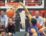  ?? LENNY IGNELZI/THE ASSOCIATED PRESS ?? Boise State guard Derrick Marks struggled from the floor, but not on this dunk Saturday against San Diego State. Marks had 18 points and the Broncos won 56-46.