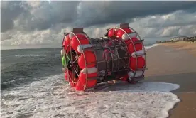  ?? Photograph: Flagler County Sheriff's Office ?? A Florida resident washes ashore after trying to ‘walk’ to New York in bubble device.