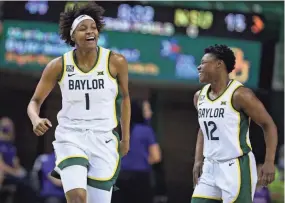  ?? ROD AYDELOTTE/WACO TRIBUNE-HERALD VIA AP ?? Baylor’s Nalyssa Smith, left, celebrates against Northweste­rn with Moon Ursin in the first half Friday.