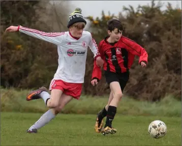  ??  ?? Ryan Boland of Gorey Rangers battling with Cormac Lyons (Kilmore United).