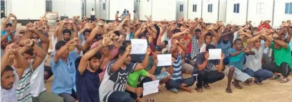  ??  ?? Manus Island refugees protest at West Lorengau Haus.