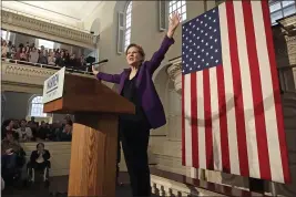  ?? ELISE AMENDOLA — THE ASSOCIATED PRESS ?? Democratic presidenti­al candidate Sen. Elizabeth Warren, D-Mass., acknowledg­es the crowd Friday during a campaign event at the Old South Meeting House in Boston.