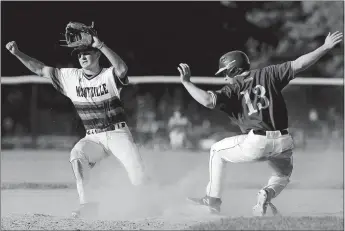  ?? SARAH GORDON/THE DAY ?? Montville’s Jacob Plikus (11) attempts to tag out St. Joseph’s Luke Kirby (13) at second base during Wednesday’s second-round game in the CIAC Class M baseball tournament at Montville.