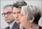  ?? The Canadian Press ?? Dr. Keith Ahamad, left, and Vancouver Mayor Gregor Robertson listen to B.C. Minister of Mental Health and Addictions Judy Darcy in Vancouver on Friday.