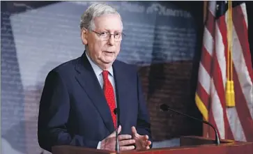  ?? Patrick Semansky Associated Press ?? SENATE leader Mitch McConnell says that not protecting businesses from lawsuits related to COVID-19 would “dramatical­ly slow” the economic recovery, calling it a “red line” in GOP negotiatio­ns with Democrats.