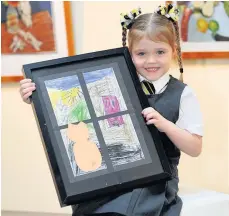  ??  ?? Art attack Niamh McKniff, five, won first prize for her creation