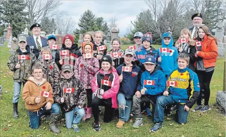  ?? SPECIAL TO THE EXAMINER ?? Grade 5 and 6 students from Havelock Belmont Public School visited the local cemetery last week to find the final resting places of local First World War veterans interred there.