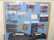  ??  ?? This photo shows some of the Second World War memorabili­a that was stolen from an Asquith seniors’ centre late Monday or early Tuesday.