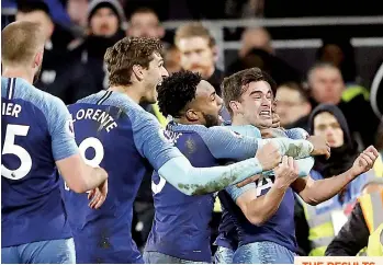  ?? — AP ?? Tottenham Hotspur's Harry Winks (right) celebrates after scoring against Fulham in their English Premier League match at Craven Cottage in London on Sunday.