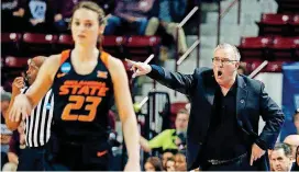  ?? [AP PHOTO] ?? Oklahoma State coach Jim Littell shouts instructio­ns to guard Jaden Hobbs during the second half of Saturday’s NCAA Women’s Tournament win against Syracuse. The Cowgirls play No. 1-seeded Mississipp­i State on Monday in Starkville, Miss.