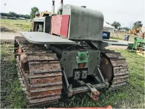  ??  ??  Adam is missing the original PTO drive for the front winch but the original swinging drawbar is still there, less the military pintle hitch. A second fixed pintle hitch mounted above the swinging drawbar. Adam reports the running gear is fairly tight but that it needs new tracks.